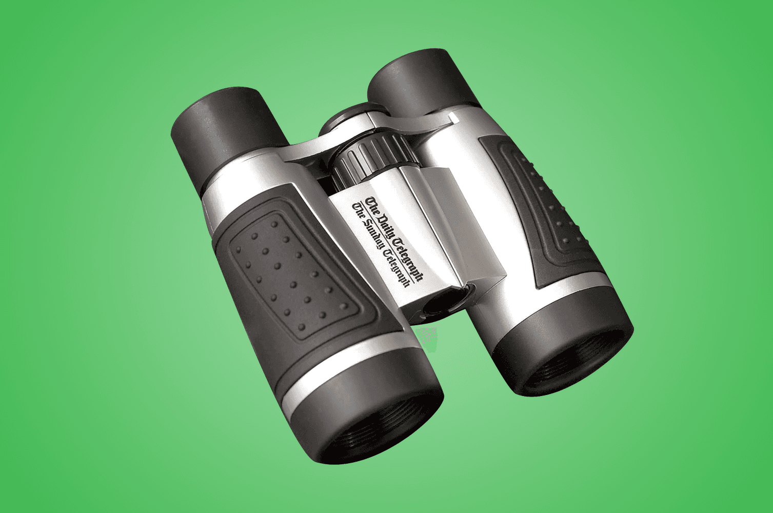 Compact silver-and-black binoculars with textured rubber grips, a central focus wheel and engraved Daily Telegraph branding.