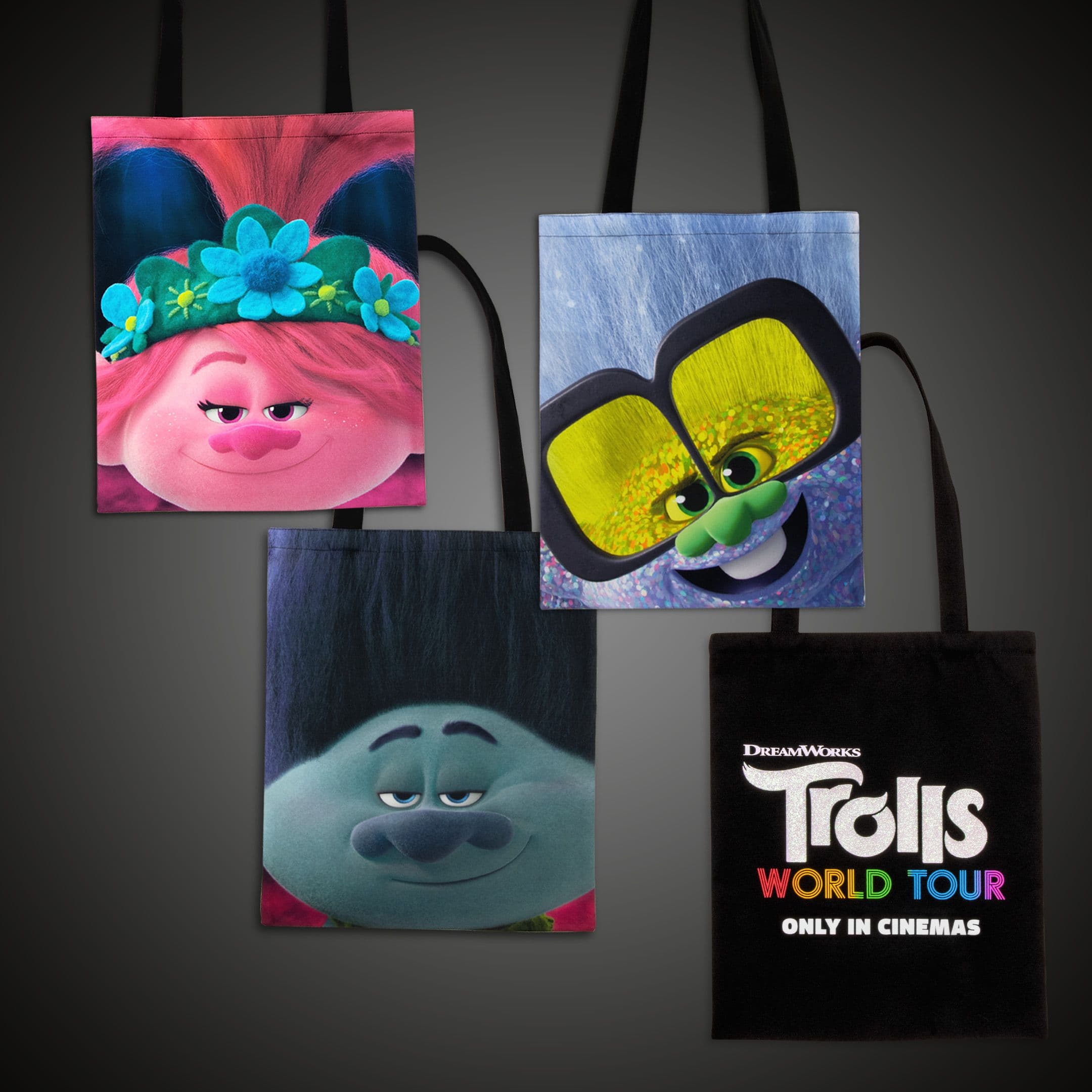 Trolls World Tour tote bag collection featuring vibrant character artwork and bold film branding.